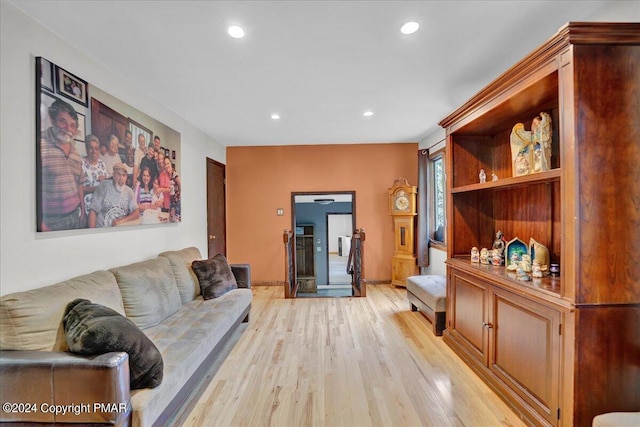 living room featuring recessed lighting and light wood-style flooring