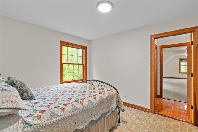 127 Timber Lake Dr, Canadensis, PA 18325 - bedroom featuring multiple windows and baseboards