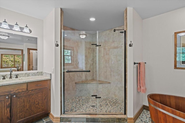 127 Timber Lake Dr, Canadensis, PA 18325 - bathroom featuring baseboards, vanity, a stall shower, and recessed lighting