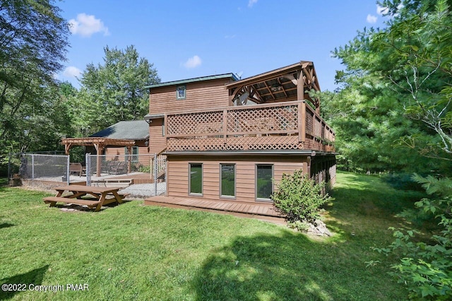 134 Moseywood Rd, Lake Harmony, PA 18624 - rear view of property with a pergola, a lawn, and a deck