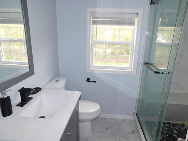 8150 Mayfair Rd, Tobyhanna, PA 18466 - bathroom with toilet, a shower stall, marble look tile flooring, and vanity