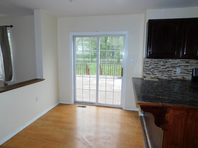 8150 Mayfair Rd, Tobyhanna, PA 18466 - unfurnished dining area featuring light wood-type flooring and baseboards