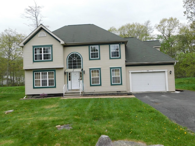 8150 Mayfair Rd, Tobyhanna, PA 18466 - view of front of home featuring asphalt driveway, a garage, and a front yard