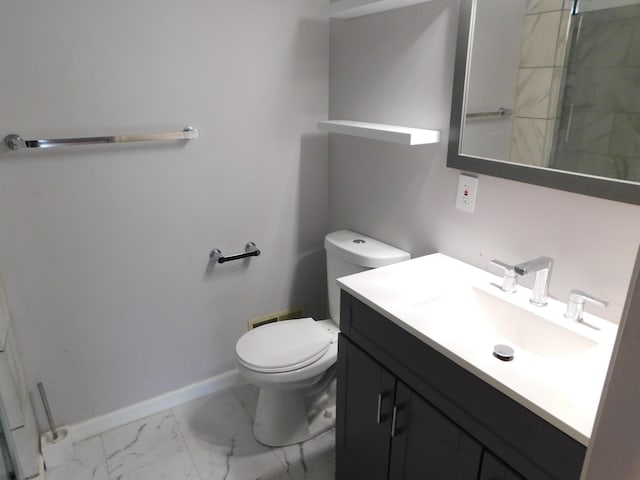 8150 Mayfair Rd, Tobyhanna, PA 18466 - bathroom with marble look tile flooring, toilet, vanity, and baseboards