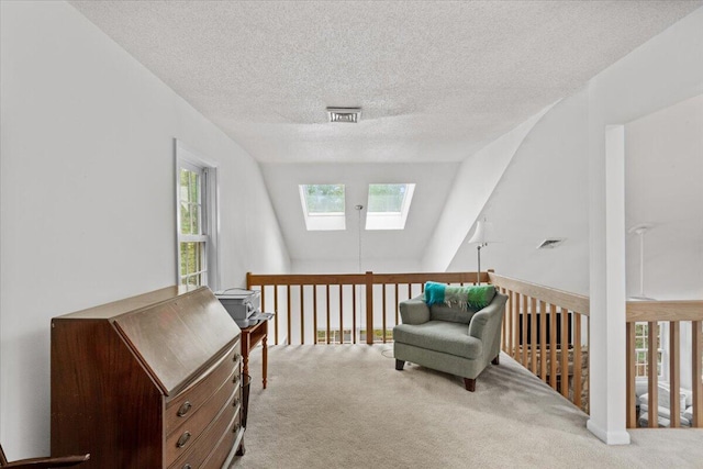 606 Buck Cir, Buck Hill Falls, PA 18323 - living area featuring a skylight, carpet flooring, and a textured ceiling