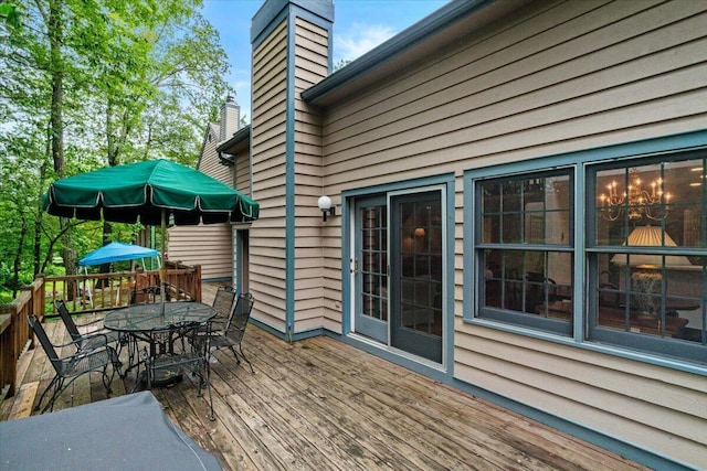 606 Buck Cir, Buck Hill Falls, PA 18323 - wooden terrace with outdoor dining area