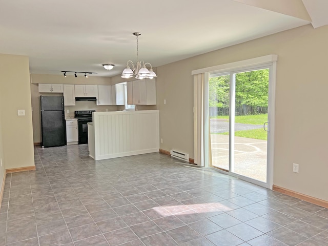 2138 Hill Rd, Effort, PA 18330 - kitchen featuring freestanding refrigerator, stove, a baseboard radiator, track lighting, and a chandelier