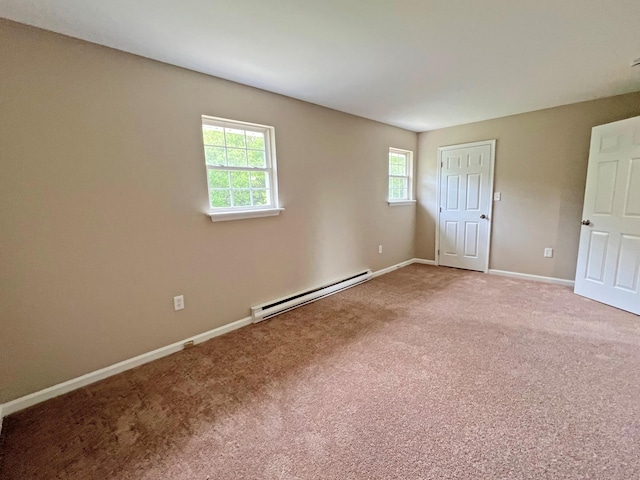 2138 Hill Rd, Effort, PA 18330 - unfurnished bedroom featuring a baseboard radiator and carpet