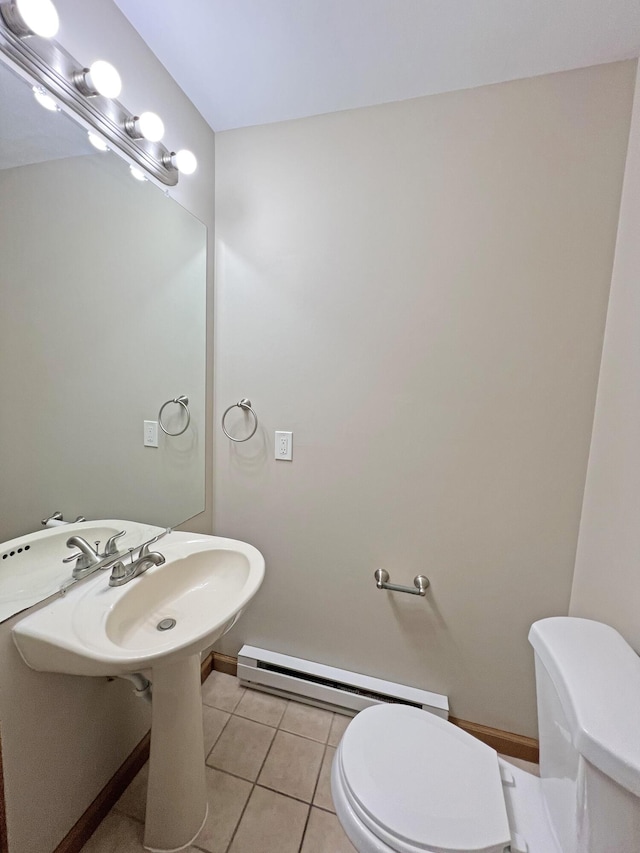 2138 Hill Rd, Effort, PA 18330 - half bathroom with baseboard heating and tile patterned flooring