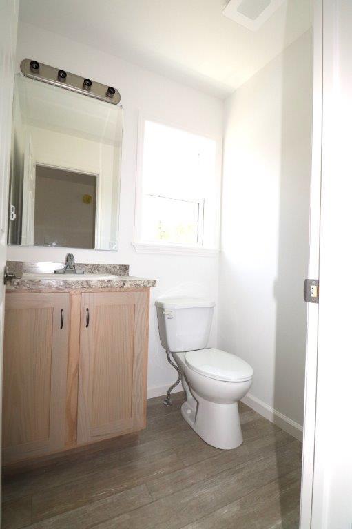 1025 W Princeton Ave, Palmerton, PA 18071 - half bath featuring vanity and wood finished floors