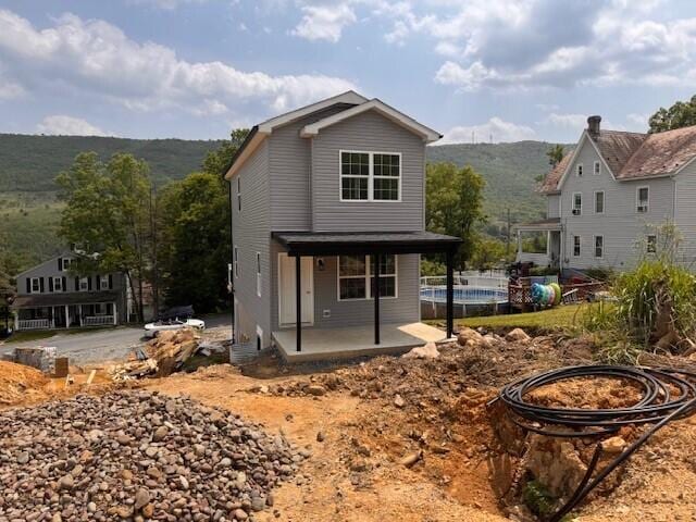 1025 W Princeton Ave, Palmerton, PA 18071 - rear view of property featuring an outdoor pool and a patio area