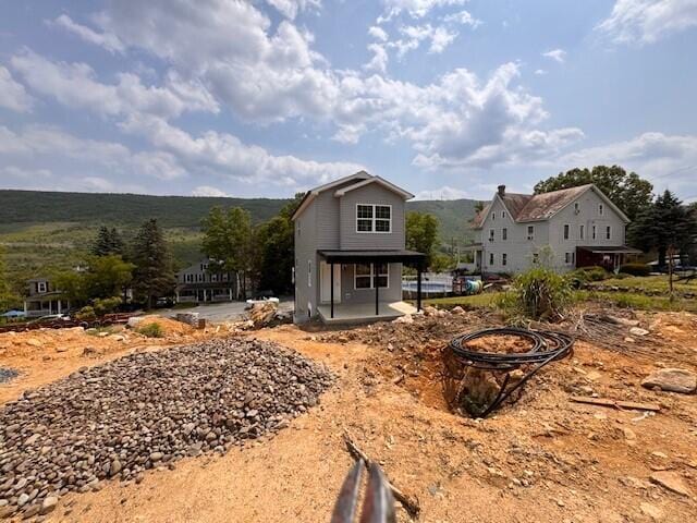 1025 W Princeton Ave, Palmerton, PA 18071 - rear view of house featuring a fire pit and a patio
