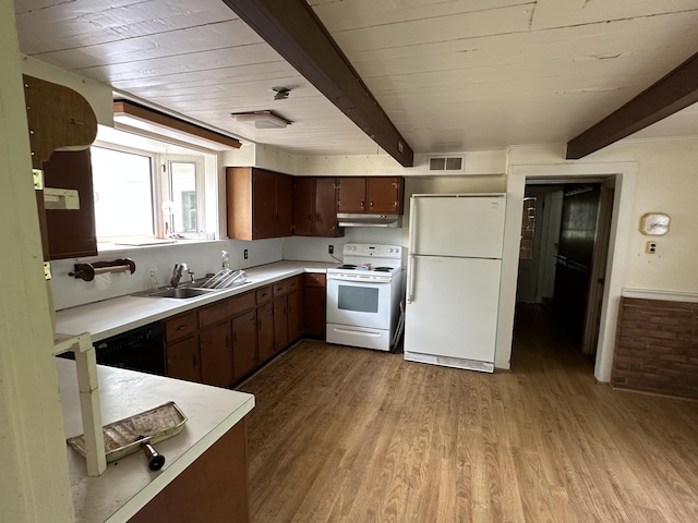 337 Summit Rd, Swiftwater, PA 18370 - kitchen with white appliances, light wood-style floors, light countertops, a wood ceiling with exposed beams, and under cabinet range hood
