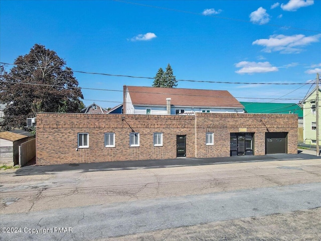 view of building exterior with a garage