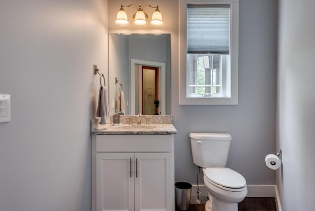 177 Wolf Hollow Rd, Lake Harmony, PA 18624 - half bathroom featuring baseboards, vanity, and toilet