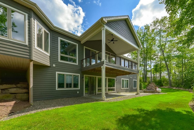 177 Wolf Hollow Rd, Lake Harmony, PA 18624 - back of house with a lawn, a ceiling fan, and a patio area