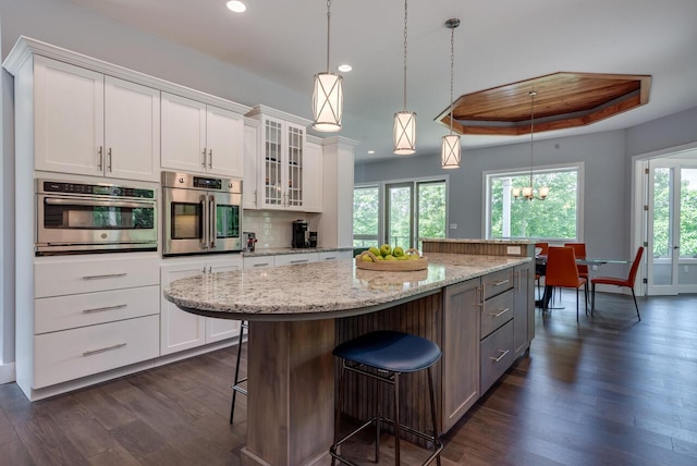 177 Wolf Hollow Rd, Lake Harmony, PA 18624 - kitchen with white cabinets, oven, recessed lighting, and dark wood-style flooring