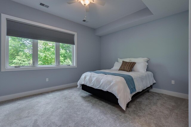 177 Wolf Hollow Rd, Lake Harmony, PA 18624 - bedroom featuring baseboards, a ceiling fan, carpet flooring, and visible vents