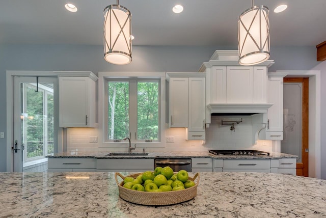 177 Wolf Hollow Rd, Lake Harmony, PA 18624 - kitchen featuring stainless steel appliances, a sink, backsplash, and a healthy amount of sunlight