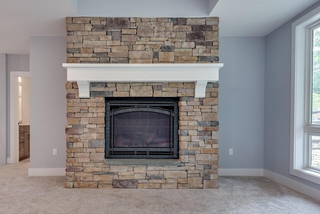 177 Wolf Hollow Rd, Lake Harmony, PA 18624 - details with a fireplace, carpet flooring, and baseboards