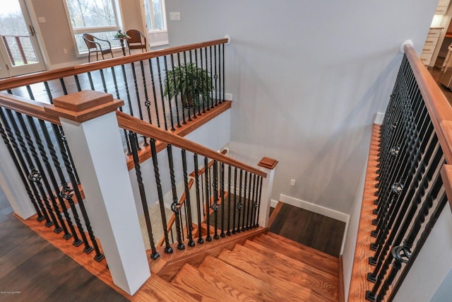 177 Wolf Hollow Rd, Lake Harmony, PA 18624 - stairs with wood finished floors and baseboards