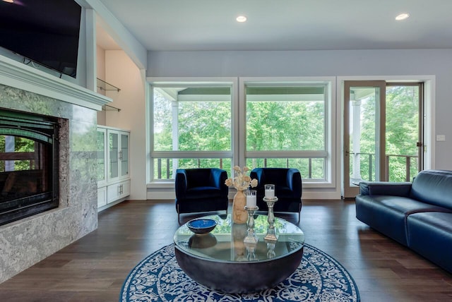 177 Wolf Hollow Rd, Lake Harmony, PA 18624 - living area featuring a fireplace, wood finished floors, and plenty of natural light