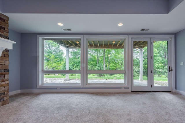 177 Wolf Hollow Rd, Lake Harmony, PA 18624 - unfurnished living room featuring carpet, visible vents, and baseboards