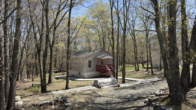 view of yard with a wooded view