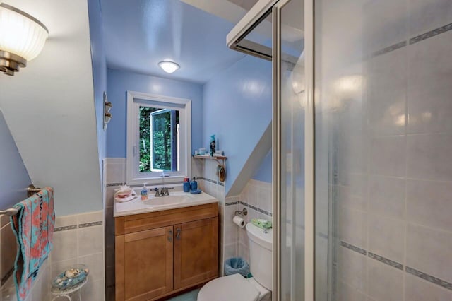 2459 Overlook Ln, Pocono Pines, PA 18350 - full bathroom featuring tile walls, a shower stall, vanity, and a wainscoted wall
