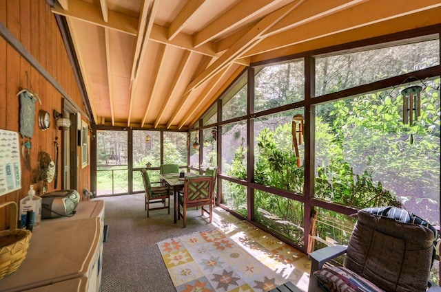 2459 Overlook Ln, Pocono Pines, PA 18350 - sunroom / solarium with lofted ceiling, carpet floors, outdoor dining space, and wood walls