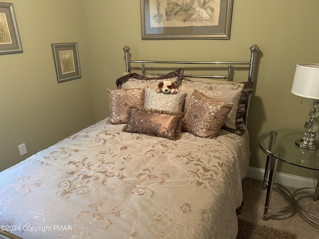 bedroom featuring baseboards