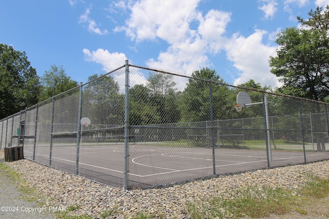 view of sport court with community basketball court and fence