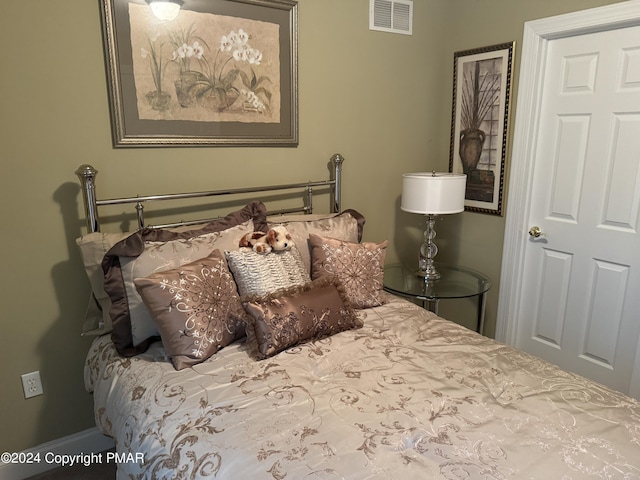 bedroom with visible vents