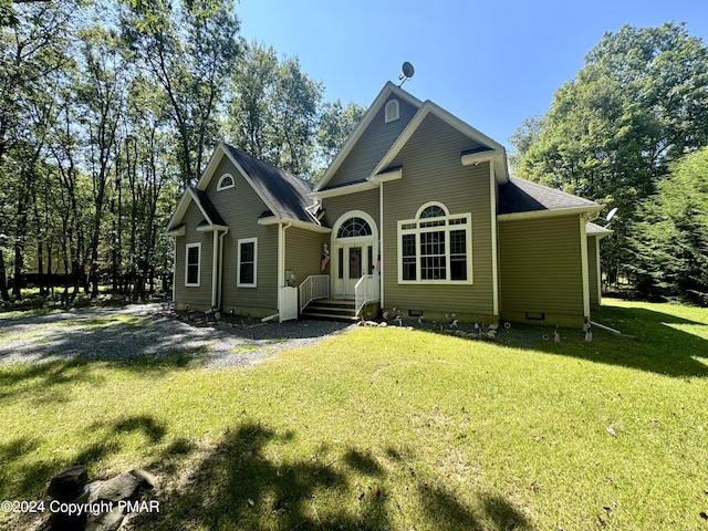 view of front of home featuring crawl space and a front lawn