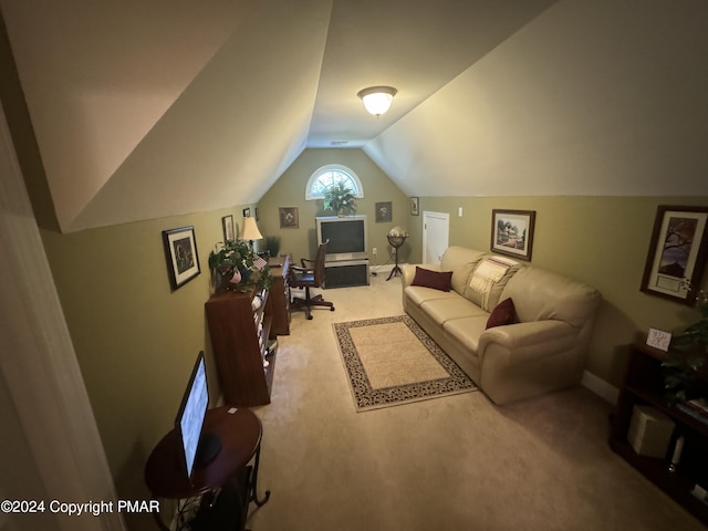 living area with baseboards, carpet flooring, and vaulted ceiling