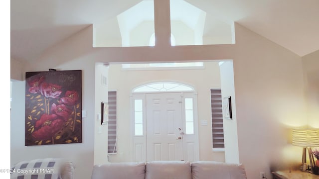 foyer with lofted ceiling