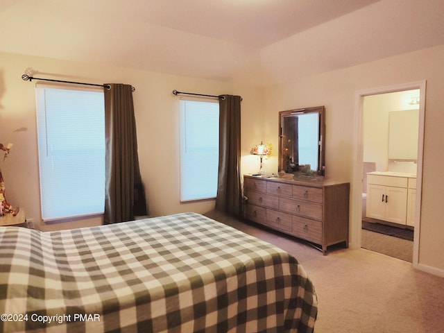 bedroom featuring carpet floors and ensuite bathroom