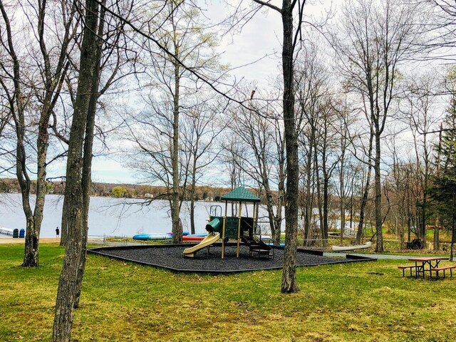 318 N Arrow Dr, Pocono Lake, PA 18347 - communal playground featuring a lawn and a water view