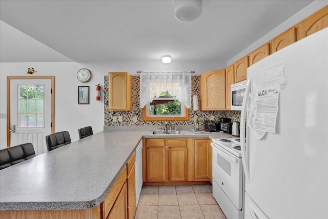 318 N Arrow Dr, Pocono Lake, PA 18347 - kitchen featuring white appliances, a peninsula, tasteful backsplash, light tile patterned flooring, and light countertops