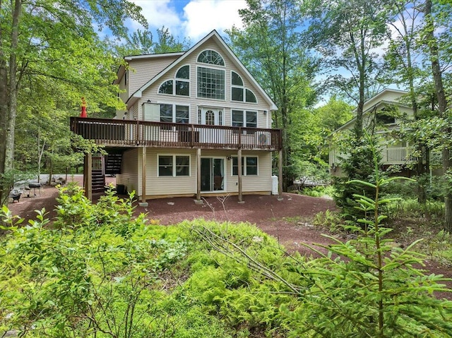 318 N Arrow Dr, Pocono Lake, PA 18347 - rear view of house with stairway and a wooden deck