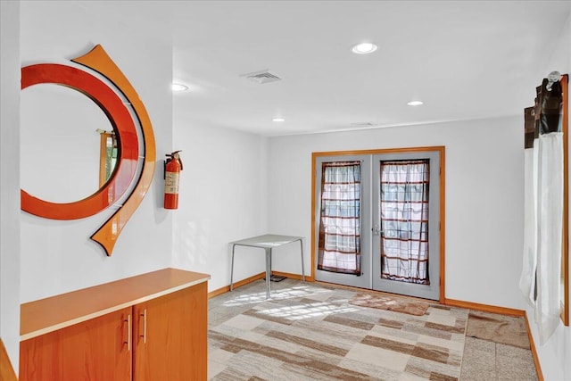 318 N Arrow Dr, Pocono Lake, PA 18347 - hallway with french doors, light colored carpet, and recessed lighting