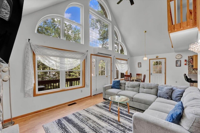 318 N Arrow Dr, Pocono Lake, PA 18347 - living room featuring high vaulted ceiling, wood finished floors, and ceiling fan
