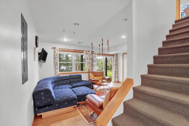 318 N Arrow Dr, Pocono Lake, PA 18347 - living area featuring wood finished floors, stairway, and recessed lighting