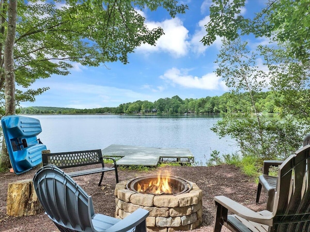 318 N Arrow Dr, Pocono Lake, PA 18347 - water view with an outdoor fire pit and a heavily wooded area