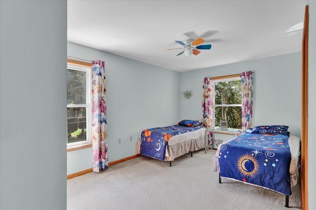 318 N Arrow Dr, Pocono Lake, PA 18347 - carpeted bedroom with baseboards and ceiling fan