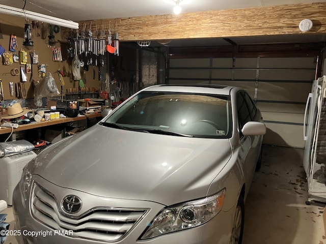 garage with a workshop area