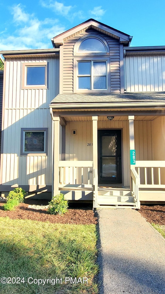 property entrance with a porch