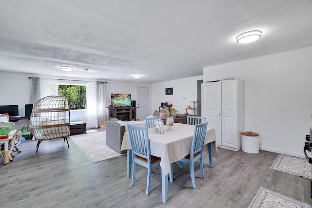 418 Leander Rd, East Stroudsburg, PA 18302 - dining area with light wood-style flooring and baseboards