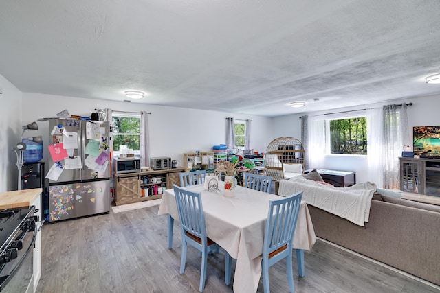 418 Leander Rd, East Stroudsburg, PA 18302 - dining area with wood finished floors and plenty of natural light