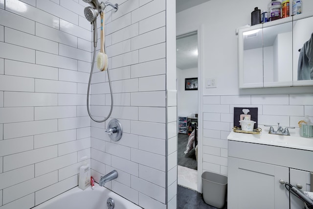 418 Leander Rd, East Stroudsburg, PA 18302 - bathroom featuring vanity, shower / washtub combination, and tile walls